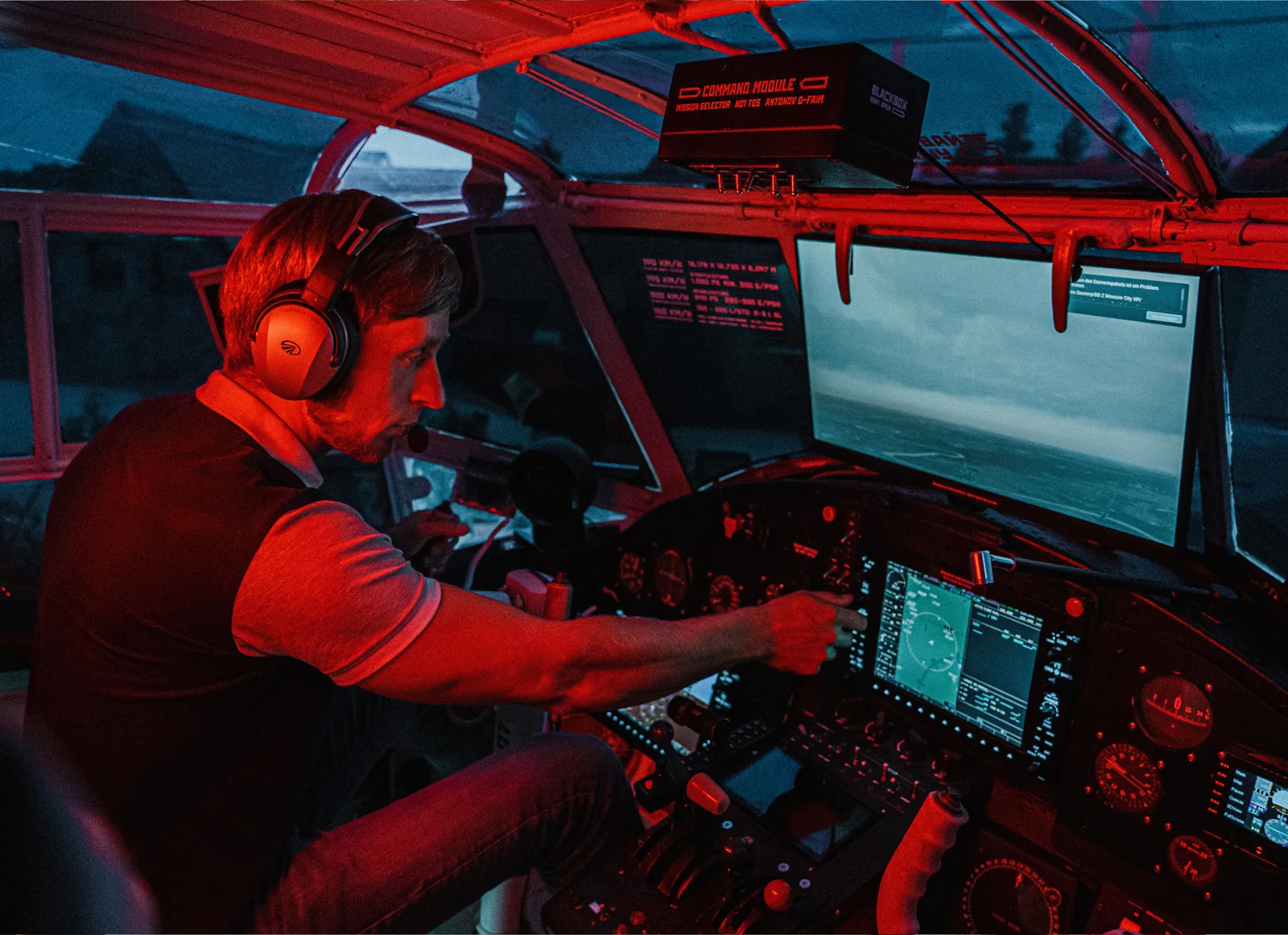 The illuminated original Antonov cockpit with instruments and flight simulator